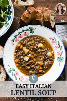 a bowl of lentil soup with bread on the side