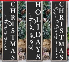 three wooden christmas signs with the words holiday and pine cones on them, sitting in front of a tree