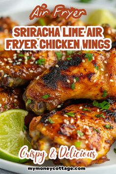 grilled chicken wings on a plate with lime wedges