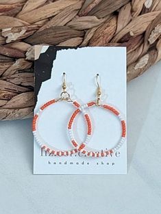 + Style name: Creamcicle + beaded hoop earrings with white and orange glass seed beads  + Hoops are 1 1/2" +/- diameter + silver or gold hoops with matching earwire see more liz.cor.creative beaded hoop earrings here https://www.etsy.com/shop/lizcorcreative?ref=seller-platform-mcnav§ion_id=42427009 If there is a particular color that you would like to see please message me + All lizcorcreative hoop earrings will come packaged on a hand-stamped kraft earring card in a clear sealed bag Free Domest Striped Earrings, Casual Earrings, Earring Card, Earring Cards, Beaded Hoop Earrings, Beaded Hoops, Gold Hoops, Free Bag, Seed Bead