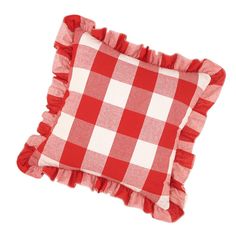 a red and white checkered pillow with ruffled edges