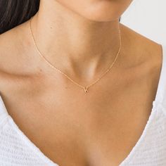 Tiny, dainty, and adorable, this Tiny Initial Necklace will be your new go-to. It's personalized just for you - wear your own initial or that of a special someone in your life. You can wear it everywhere - from your morning coffee run all the way to girl's night out. Yes - that includes the gym and the shower too! DETAILS Necklace length: 16" with 2" extender 14k gold vermeil -or- sterling silver charm - 5mm tall 14k gold filled -or- sterling silver chain, findings, & spring clasp Safe for sensi Cheap Initial Necklace, Dainty Gold Initial Necklace, Tiny Initial Necklace, Dainty Letter Necklace, Dainty Initial Necklace Gold, Necklace From Boyfriend, K Necklace, Initials Necklace, Letter Charm Necklace