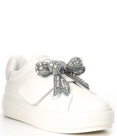 From Kurt Geiger London&#x2C; the Laney Eagle Head Crystal Bow Leather Platform Sneakers feature:Leather upperCrystal eagle head and bow embellishmentHook and loop strap closureCotton liningRubber outsoleApprox. 1.38'' heel heightRecommend sizing up one full sizeImported. Kurt Geiger Bow Bag, Kurt Geiger Heart Bag, Kurt Shoes, Kurt Geiger Jewelry, Kurt Geiger White Boots, Kurt Geiger Shoes, Bridal Sneakers, White Nike Shoes, Kurt Geiger Heels