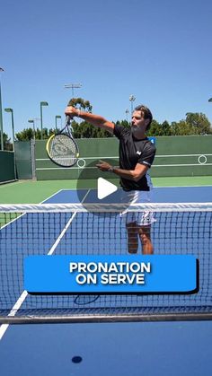 a man holding a tennis racquet standing on top of a tennis ball court