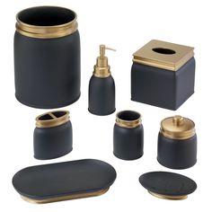 black and gold bathroom accessories including soap dispenser