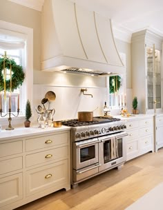 a kitchen with an oven, stove and counter tops in it's center island