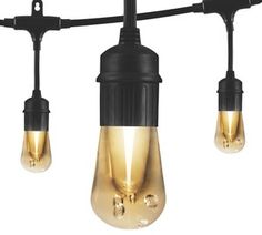 three light bulbs hanging from a black wire