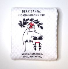 a dish towel with an image of a seal on it and the words dear santa i've been good this year