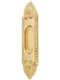 an ornate gold door handle on a white background with clipping for the letter o