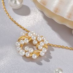 For a dazzling touch to your bridal ensembles or any formal attire, you will love this resplendently lovely pearl necklace. Made of sterling silver and encrusted with breathtaking pearls, and then decorated with leaves which is designed to lends a touch of natural beauty to your look.Carat Weight: 5.875 ctStone Size: 3,4 mmStone Type: Jeulia® StoneNumber of Stones: 22 Stone Shape: RoundStone Color: Diamond WhiteWeight: 5.47 gMaterial: Plating Color: Length: 425 mm Formal Attire, Sterling Silver Necklace, Cultured Pearls, Earring Necklace, Watch Design, Sterling Silver Necklaces, Ring Earrings, Necklaces Bracelets, Bracelet Watch