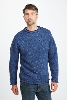 Steeped in the power of heritage and tradition. The Raheen Tweed Roll Neck Sweater is a timeless piece that holds its place in history and the present. Featuring a rolled crew neck collar, hem and cuffs with ribbing at the neck, you’ll find this piece brings a flattering, relaxed fit. Crafted with 100% Pure New Wool with set in sleeves and fully linked seams, the Raheen gives the wearer a perfect, smooth finish. Aran Islands, Irish Sweater, Sweater Vest Mens, Green Tweed, Blue Tweed, Grey Tweed, Mens Sweater, Blue Crew, Roll Neck Sweater