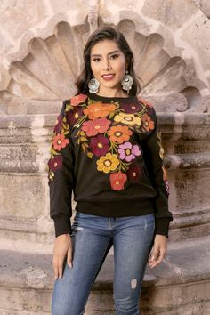 Introducing our exquisite Mexican Floral Embroidered Crew Neck, a wearable work of art crafted with precision on artisanal machines. This vibrant and intricately embroidered piece seamlessly blends traditional Mexican craftsmanship with modern style. Each delicate petal and intricate detail is brought to life through skillful embroidery, showcasing the rich heritage of Mexican artistry.  The crew neck's soft fabric ensures comfort, while the floral motif adds a touch of elegance and cultural fla Floral Sweatshirt, Womens Sweatshirts, Boho Chic Style, Boho Chic Fashion, Style Moderne, Floral Motif, Chic Style, Soft Fabrics, Boho Chic