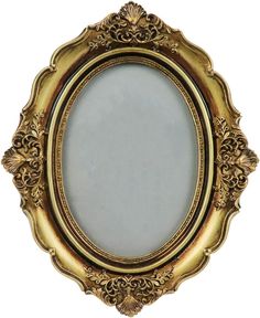 an ornate gold framed mirror on a white background