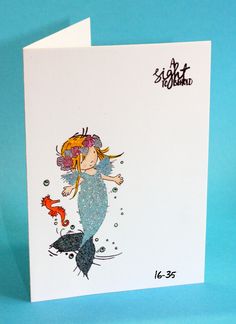 a card with an image of a mermaid on it