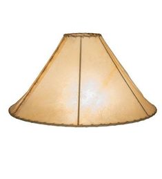 an old fashioned lamp shade on a white background