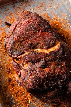 how to sous video pork shoulder on a baking sheet with seasoning sprinkled around it