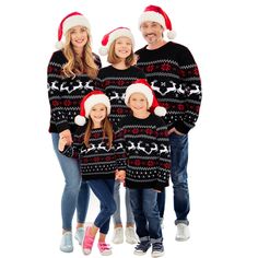 a family wearing ugly ugly christmas sweaters