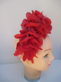 * A versatile headpiece this vibrant red rose fascinator can be worn all year round from now to Halloween to Christmas to Valentine's Day and any events in between! * The roses are nestled together to form the traditional halo affect and the pieces is well balanced, secure and comfortable to wear. * It has been designed on an acrylic headband covered in grosgrain ribbon. * Great for a Bridesmaid's headpiece, this can be made in any color desired. Wear it for Halloween, Ladies Luncheon, Benefit D Bridesmaid Headpiece, Ladies Luncheon, Red Silk, Costume Hats, Gold Pearl, Black Rose, Vibrant Red, Grosgrain Ribbon, Lily Pads