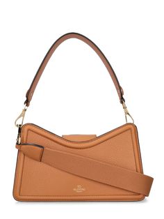 The VALENTINO GARAVANI V Logo Leather Shoulder Bag features a flap open closure and a top handle. The bag is crafted from leather and measures 14.5cm in height, 24cm in width, and 8cm in depth. It also features a detachable and adjustable strap. The bag is accented with logo details. Cognac Evening Shoulder Bag, Evening Bags With Detachable Strap In Cognac, Luxury Camel Shoulder Bag With Leather Lining, Cognac Evening Bags With Detachable Strap, Cognac Bag With Detachable Handle In Calf Leather, Luxury Cognac Calf Leather Bag With Detachable Handle, Cognac Calf Leather Bag With Detachable Handle, Cognac Shoulder Bag For Evening, Cognac Calf Leather Shoulder Bag With Gold-tone Hardware