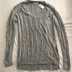 Gray Knit Lightweight Sweater. Brand New With Tag Gray Casual Knit Top For Spring, Casual Cable Knit Tops For Spring, Casual Gray Knit Top For Spring, Casual Spring Cable Knit Tops, Casual Cable Knit Top For Layering, Casual Pointelle Knit Sweater For Layering, Casual Gray Knitted Top, Casual Fitted Soft Knit V-neck Sweater, Fitted Soft Knit Casual V-neck Sweater