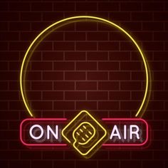 on air neon sign with brick wall and round frame in the middle, glowing yellow