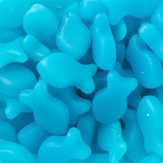 blue gummy bears are piled up together