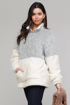 Product Name: Oversize Fluffy Fleece Pullover Zip Neck Multi Color Item NO. LC85145-1011 Weight: 0.682 kg = 1.5036 lb = 24.0568 oz Category: Outerwear, Sweatshirts & Hoodies Size Guide: Small (4-6) Medium (8-10) Large (12-14) Extra Large (16-18) 2X Extra Large (18-20)   *Zipped turtleneck, cozy oversize fit *Pullover design with kangaroo pocket on the front *Ultra soft pile fleece keep you warm and fashionable *Heavyweight outwear suitable for cold temperatures *Simple fashion essential wardrobe for blustery winter weather Gray Fleece Winter Top, Cozy Fit Long Sleeve Fleece Jacket, Winter Loungewear Tops With Half-zip, Winter Loungewear Half-zip Tops, Winter Half-zip Loungewear Tops, Cozy Crew Neck Fleece Jacket For Fall, Cozy Crew Neck Fleece Jacket, Cozy Fleece Jacket With Crew Neck, Gray Winter Tops With Soft Texture