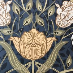 an art nouveau painting with flowers and leaves on it's blue backgrounnd