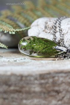 "Delivery of orders is carried out as usual. All orders are being sent using our warehouse in the United States via USPS. Delivery of orders is carried out as usual. All orders are being sent using our warehouse in the United States via USPS. Resin necklace in a teardrop shape with real Juniper leaves. The juniper tree is believed to possess the ability to cleanse and make us pure and true to ourselves. ✿... The pendant measures about 1,6\" tall by 0,7\" wide and about 0,4\" deep ( 40mm x 18mm x Green Teardrop Nature-inspired Jewelry, Nature-inspired Green Teardrop Jewelry, Teardrop Necklace With Natural Inclusions, Handmade Teardrop Necklace With Nature-inspired Style, Handmade Teardrop Necklace With Nature-inspired Design, Handmade Teardrop Necklace In Nature-inspired Style, Nature-inspired Green Jewelry With Birth Flower, Nature-inspired Teardrop Pendant Necklace As Gift, Nature-inspired Teardrop Pendant Necklace For Gifts