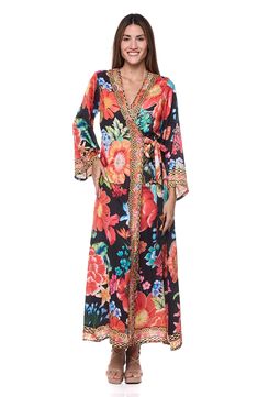 Cover-up your beach-ready look with this lightweight kimono covered in a blooming floral print with a removable tie belt. Open front Long sleeves Three-quarter sleeves Removable tie belt 100% polyester Hand wash, dry flat Imported Spring V-neck Kimono With Belt, Spring V-neck Robe For Brunch, Summer Beach Kimono With Belt, Multicolor Floral Print Wrap Robe, Spring Beach Cover-up Kimono With Tie Waist, Spring Kimono With Tie Waist For Beach, Beach Kimono With Belted Kimono Sleeves, Beach Kimono With Belt, Summer Long Sleeve Belted Kimono