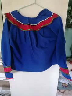 Traditional Shipibo ceremony blouse. There are two that can be bought seperately. Blue and green one. From San Francisco region, Ucayali. Cotton Long Sleeve Costume Top, Long Sleeve Folk Blouse For Festivals, Long Sleeve Folk Style Blouse For Festivals, Traditional Ceremonial Tops For Festivals, Festive Vintage Long Sleeve Blouse, Folk Style Long Sleeve Tops For Festivals, Traditional Blue Long Sleeve Tops, Traditional Long Sleeve Blue Tops, Blue Vintage Blouse With Collar