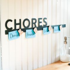 there is a sign that says chores on the wall