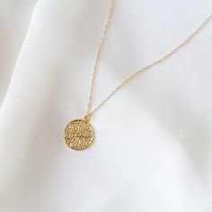 "A simple gold coin with an abstract filigree pattern. Model is wearing the 18 inches. MEASUREMENTS AND MATERIALS: Materials: 14K gold filled chain. 14K gold plated coin. COMPLETE THE LOOK: https://www.etsy.com/listing/738818173/rose-quartz-necklace-rose-quartz-pendant --------------------♥ PROMOS ♥-------------------- Want 10% off? Join the mailing list by visiting http://bit.ly/vedern . --------------------♥ BUY WITH CONFIDENCE ♥-------------------- Don't love it? Message me to set up a return Necklace Gold Pendant, Necklace Trendy, Filigree Pattern, Trendy Necklace, Layered Necklace Set, Rose Quartz Pendant, Rose Quartz Necklace, Trendy Necklaces, Gold Coin