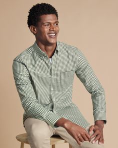 100% cotton, Available in classic, slim and extra slim fit, Non-iron, Button-down collar, Rounded button cuff with two buttons, Classic and slim fit: back pleats, Extra slim fit: back darts, Left chest pocket, Machine washable - Button-Down Collar Non-Iron Twill Gingham Check Shirt - Olive Green | Men's Charles Tyrwhitt Button-Down Collar Non-Iron Twill Gingham Checkered Casual Shirt - Olive Green Size Large Cotton Mens Gingham Shirt Outfit, Checkered Polo Outfit For Men, Classic Fitted Flannel Workwear Shirt, Fitted Flannel Shirt For Workwear, Fitted Button-up Flannel Shirt For Work, Fitted Collared Flannel Shirt For Workwear, Classic Fitted Flannel Shirt With Button Closure, Classic Flannel Shirt With Button Closure For Spring, Classic Spring Flannel Shirt With Button Closure