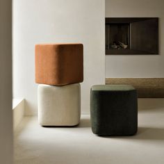 two stools sitting next to each other in a room