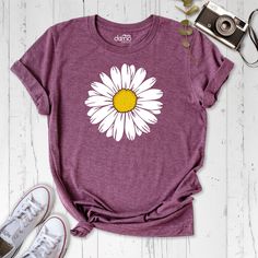 Daisy Women Shirt, Wildflower Lady Tshirt, Flower Spring Shirt, Plant Lover Tshirt, Summer Mom Shirt, Floral Outfit, Flowers Birthday Shirt Embrace the beauty of nature with our Daisy Women Shirt. This wildflower lady tshirt is perfect for adding a touch of floral charm to your spring and summer wardrobe. Whether you're a plant lover or just love the vibrant colors of flowers, this shirt is a must-have. Made from high-quality materials, this flower spring shirt is not only stylish but also comfo Mother's Day Floral Print Crew Neck T-shirt, Spring Printed Tops For Gift, Printed Tops For Spring Gift, Printed Tops For Spring, Floral Print Relaxed Fit Tops As Gift, Floral Print Graphic Tee As Gift, Floral Print Graphic Tee As A Gift, Spring Funny Print Shirt As Gift, Graphic Tee With Floral Print As A Gift