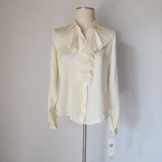 Lauren Ralph Lauren 100% Silk Satin Ruffle Blouse Long Sleeve Button-Up Cream New With Tag. Please Note *The Real Color Of The Item May Be Slightly Different From The Pictures Shown On Website Caused By Many Factors. *Don't Go By Size Number. Do Check Measurements To Determine If The Item Will Fit. Measurements; Approximately (Laying Flat). Shoulder To Shoulder: 15 Inches (Shoulder Seam To Shoulder Seam) Sleeve Length: 24 Inches (Shoulder Seam To Cuff) Armpit To Armpit: 20 Inches (Chest Measurem Ruffle Long Sleeve Blouse, Blouse Long Sleeve, Twill Shirt, Tennis Dress, Polo Shirt Women, Ralph Lauren Tops, Black Ruffle, Long Blouse, Retro Dress