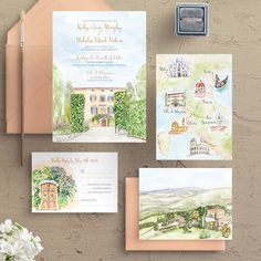 the wedding stationery is set up with watercolors and envelopes for guests