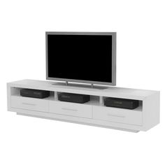 a flat screen tv sitting on top of a white entertainment center next to two drawers