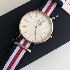 Brand New Daniel Wellington With The Original Box And The Tag. Dw White Dial Men's Watch Dw00100002 Case Size : 40 Mm Dial Color : White Crystal : Scratch Resistant Mineral Band Type : Strap Band Material : Nylon Band Color(S) : Blue, Red, White Water Resistance : 30 Meters / 100 Feet Casual Chronograph Watch As Gift, Casual White Everyday Watch, Classic Everyday Blue Watch, Classic White Watch Accessories For Everyday, Classic White Watch Accessories For Everyday Use, Classic White Watch For Everyday, Classic White Watch For Everyday Wear, Classic White Watch For Everyday Use, Casual White Watches For Gifts