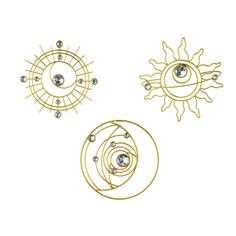 three different types of sun and moon designs on a white background, each with an individual's eye in the center