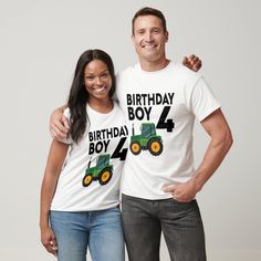 a man and woman standing next to each other in front of a white background wearing birthday shirts