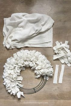 the supplies needed to make this wreath are laid out