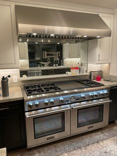 a stainless steel stove top oven in a kitchen