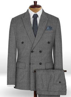 The Napolean Sharkskin Gray Wool Double Breasted suit is carefully designed with built in charisma and is a strong outfit to stand up to the demand of your day. Crafted from wool blend, the wool suit features a smooth sharkskin fabric with a soft texture and two toned appearance making it a unique go-to garment. Pair it with a crisp white shirt, black dotted tie and black dress shoes. 
 
 Look Includes  Napolean Sharkskin Gray Wool Fabric  Double Breasted Jacket Style  Peak Lapel  Real Horn Roya Strong Outfit, White Linen Suit, Green Velvet Jacket, Peaky Blinders Suit, Grey Wool Suit, Royal Blue Suit, Office Wardrobe, Beige Suits, Blue Chinos