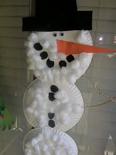 a snowman made out of paper plates