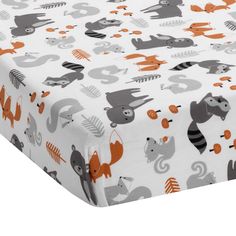 an image of a baby crib sheet with animals on it