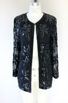 "Absolutely Stunning Vintage Lillie Rubin Sequin jacket!! This is in excellent condition! Hooks on the front along with bugle beads...this is a stunning piece. there is no lining on the sleeves which will make you cooler Measuring: 28\" long Width: 38\" Sleeves:21.5\" Stunning and in Excellent condition A staple for any wardrobe Pet Free/smoke free Enjoy" Vintage Sequined Formal Outerwear, Vintage Formal Outerwear With Sequins, Vintage Beaded Evening Outerwear, Vintage Formal Sequined Outerwear, Vintage Beaded Party Outerwear, Dressy Jackets, Old Dresses, Sequin Jacket, Cute Jackets