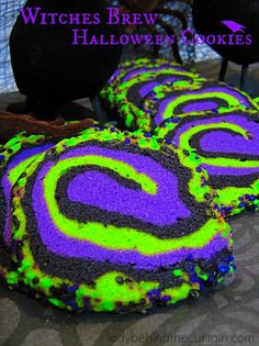 decorated cookies sitting on top of a table