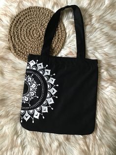 "~~ MANDALA DESIGN  ART TOTE BAG WITH ZIPPER / BLACK LINEN FABRIC BAG / TOTE WITH TOP HANDLE  ~~ Lightweight tote bag totally hand painted and well sewed, much durable. This handmade mandala art bag recommended for daily use.  # Dimensions :  *Bag Height 14\" x Width 14\"                             *Top Handle Height 12\" # Materials / Color : * Linen Fabric - Black ( Outside )                                     * Lace Cotton Fabric - Black ( Inside ) # Paint  : Fervicryl Acrylic Fabric Paint  # Closure : No.05 Size Zipper - Black Color Every part of this bag is made by our hands by using high quality materials. Thank You.. Have a nice day..!!" Art Bag Design, Totes Bag Painting, Painting On Cotton Bags, Top Painting Designs, Painting Ideas For Bags, Bag Material Fabrics, Mandala Art On Fabric, Canvas Bag Ideas Design, Hand Bag Painting Ideas